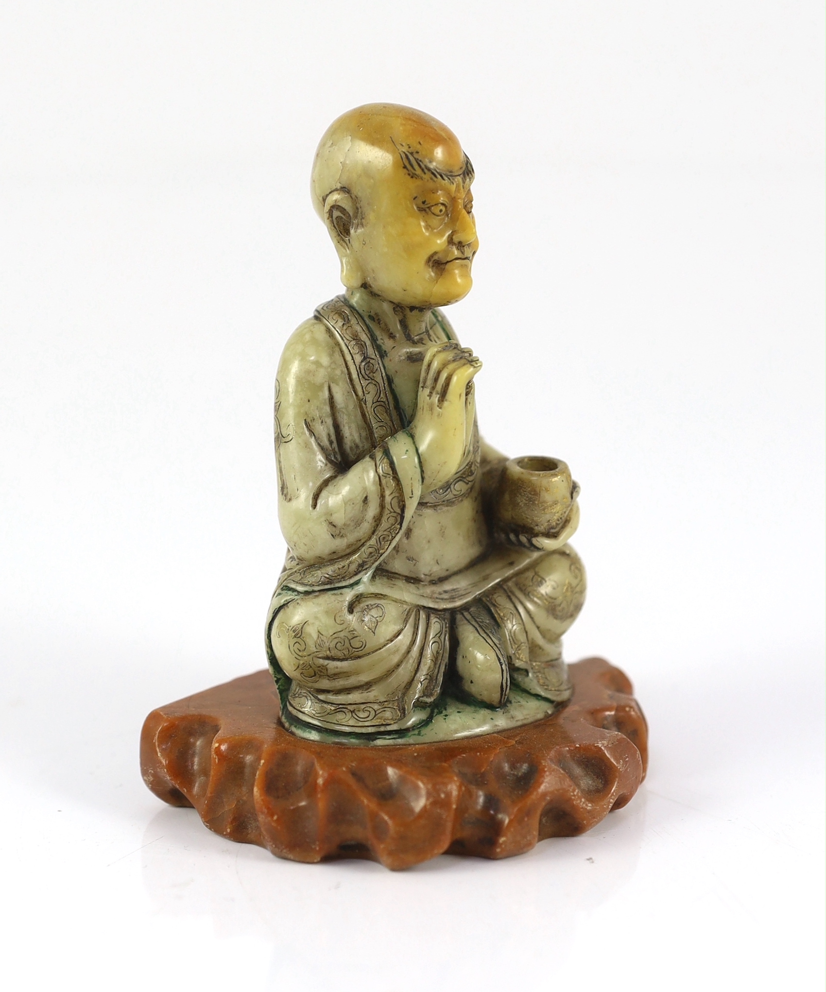 A Chinese soapstone seated figure of a luohan, 18th century